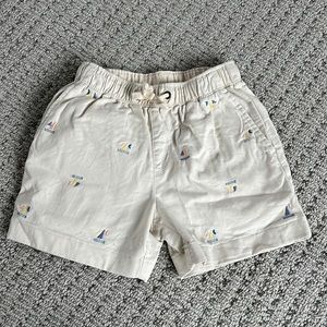 Boys khaki color draw string shorts with sailboats embroidered on them! Size 7!